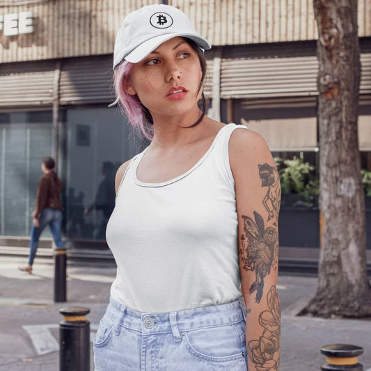 a tattooed girl wearing a bit swagg stenciled bitcoin cap in white