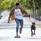 man skateboarding with a dog wearing a bit swagg bitcoin pet dogs t-shirt in white