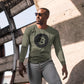 a man with shades wearing a bit swagg bitcoin alpha logo long sleeve in military green