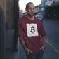 an older tattooed man wearing a bit swagg bitcoin square logo long sleeve in maroon