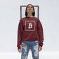 a woman rocking a bit swagg bitcoin vertices sweatshirt in maroon
