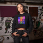 a woman wearing a bit swagg bitcoin pop art cropped hoodie in black