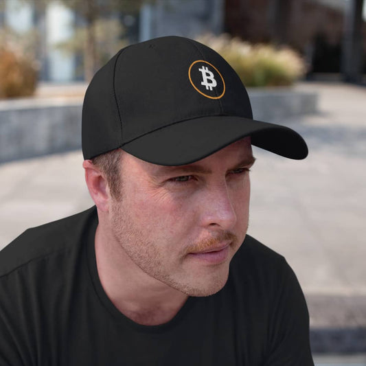 guy wearing a bit swagg bitcoin stenciled flexfit hat in black